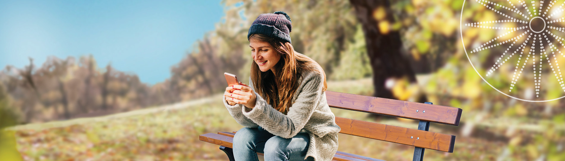 young woman sitting on a bench with a smartphone, wearing a toque